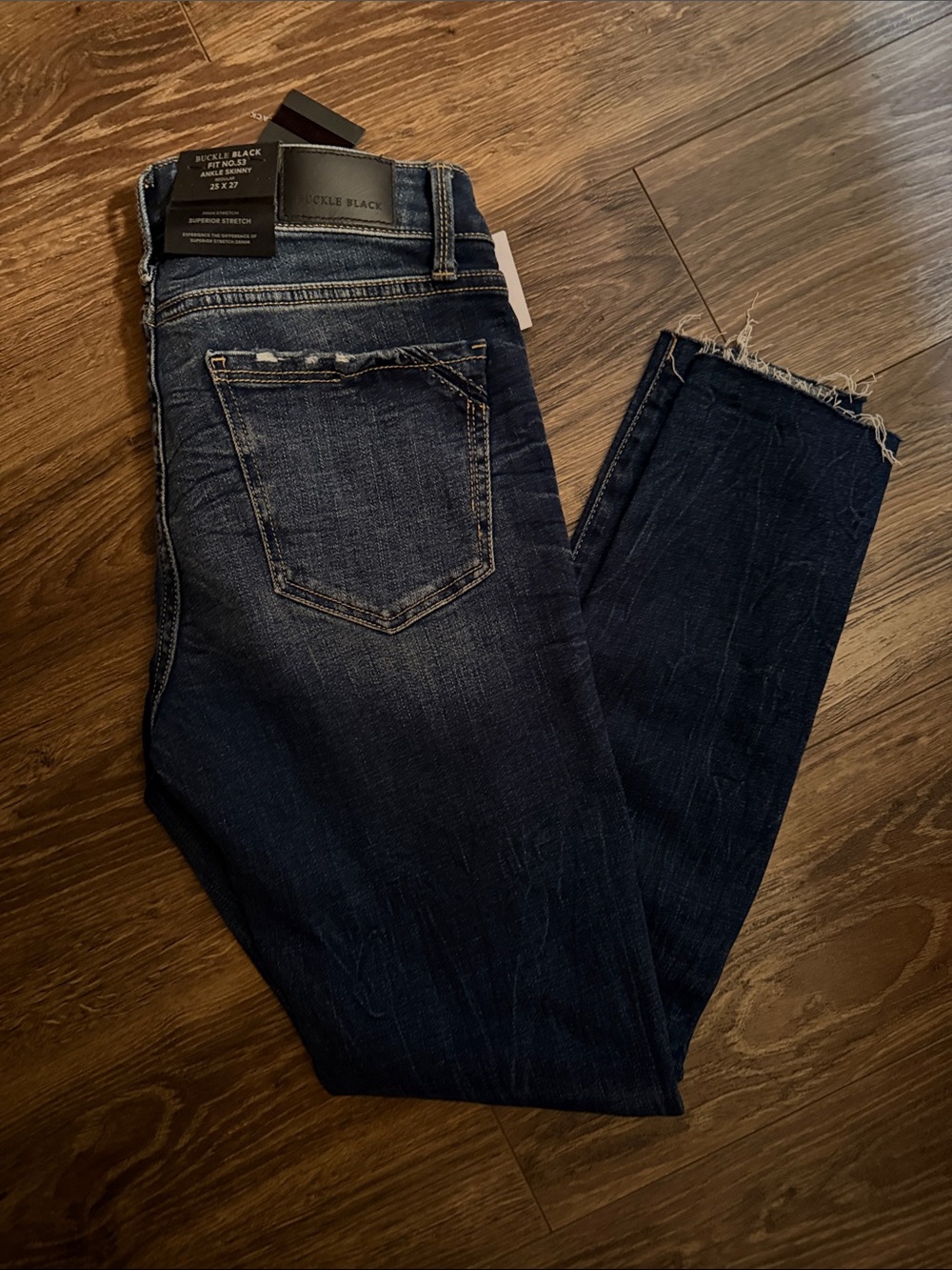 Buckle Dark Wash Distressed Skinny Jeans